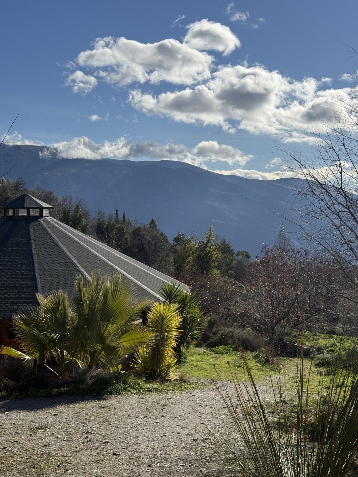 A temple roof and the mountains