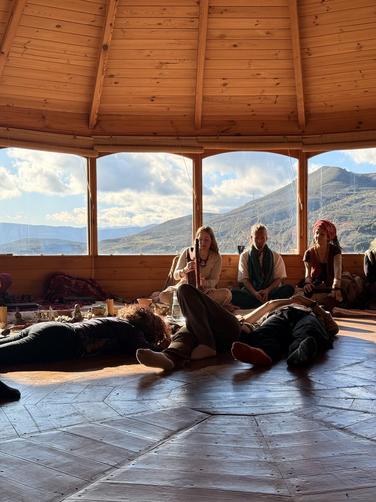 Resting together, mountains through the glass
