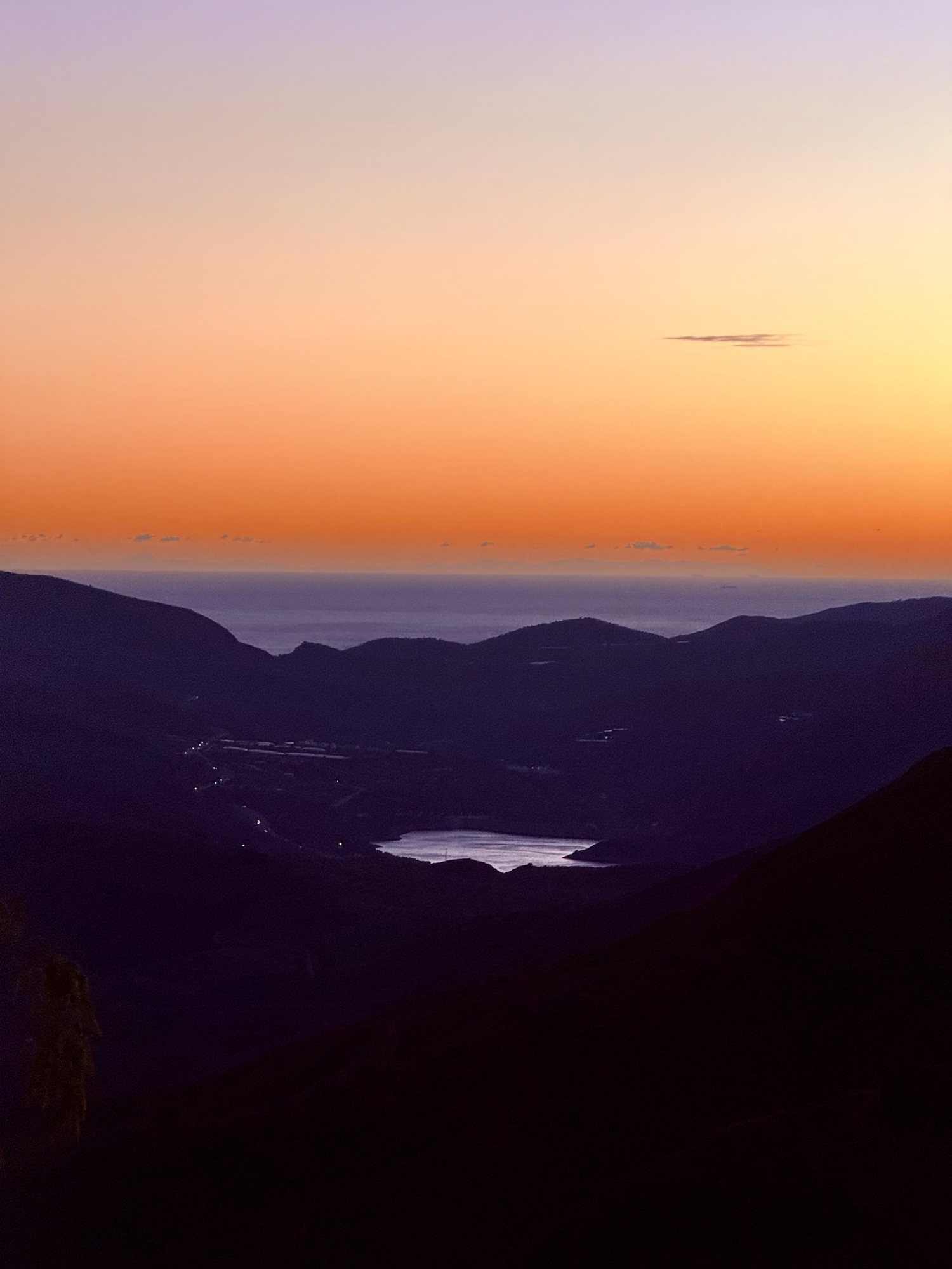 Sunset over the valley, the reservoir below