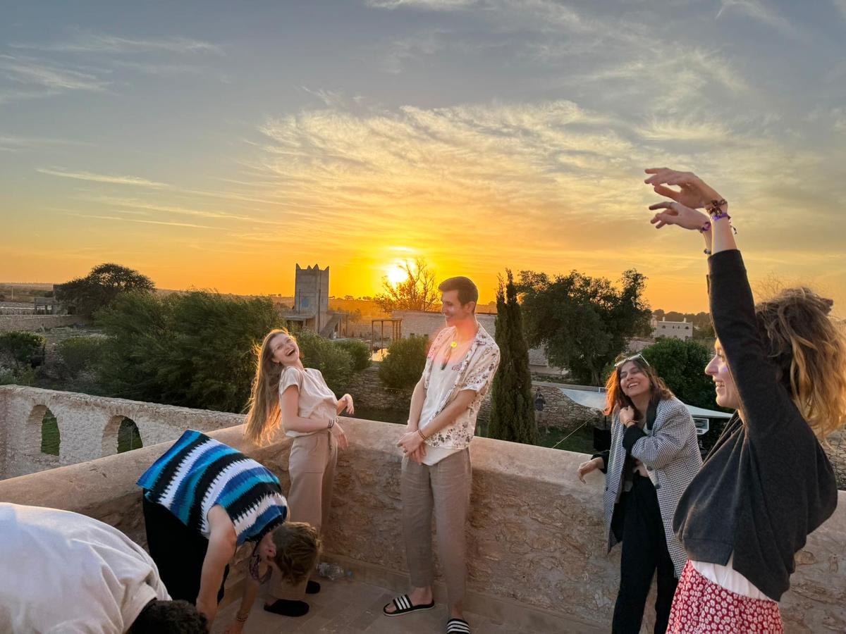 A rooftop at sunset, the end of a good day