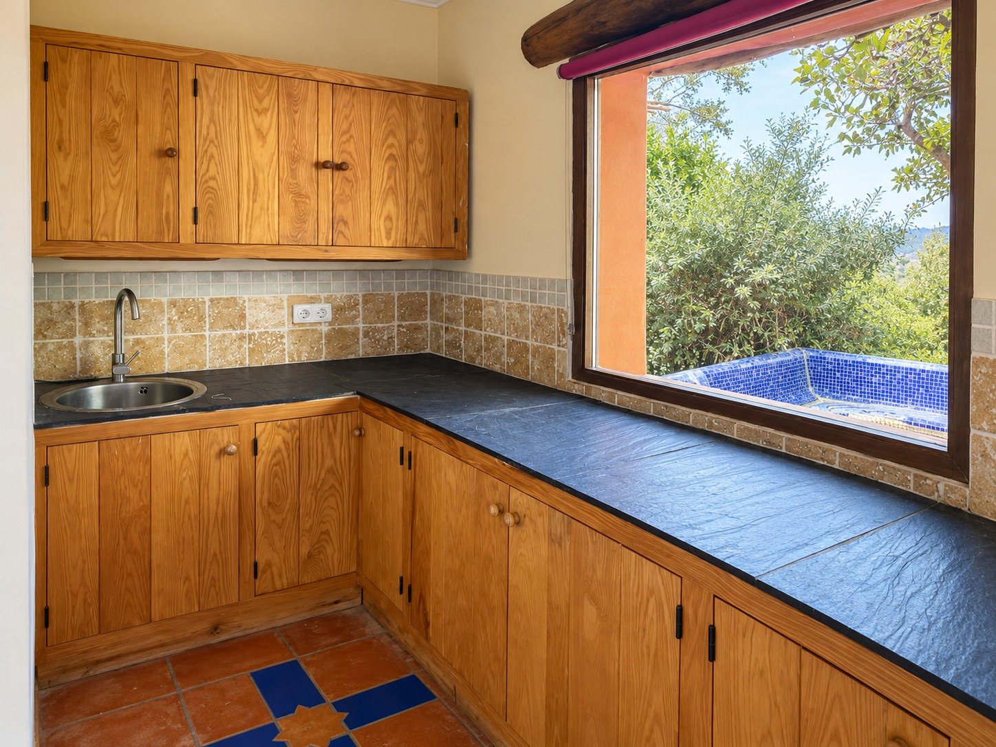 La Roja — The kitchen, a window onto the trees