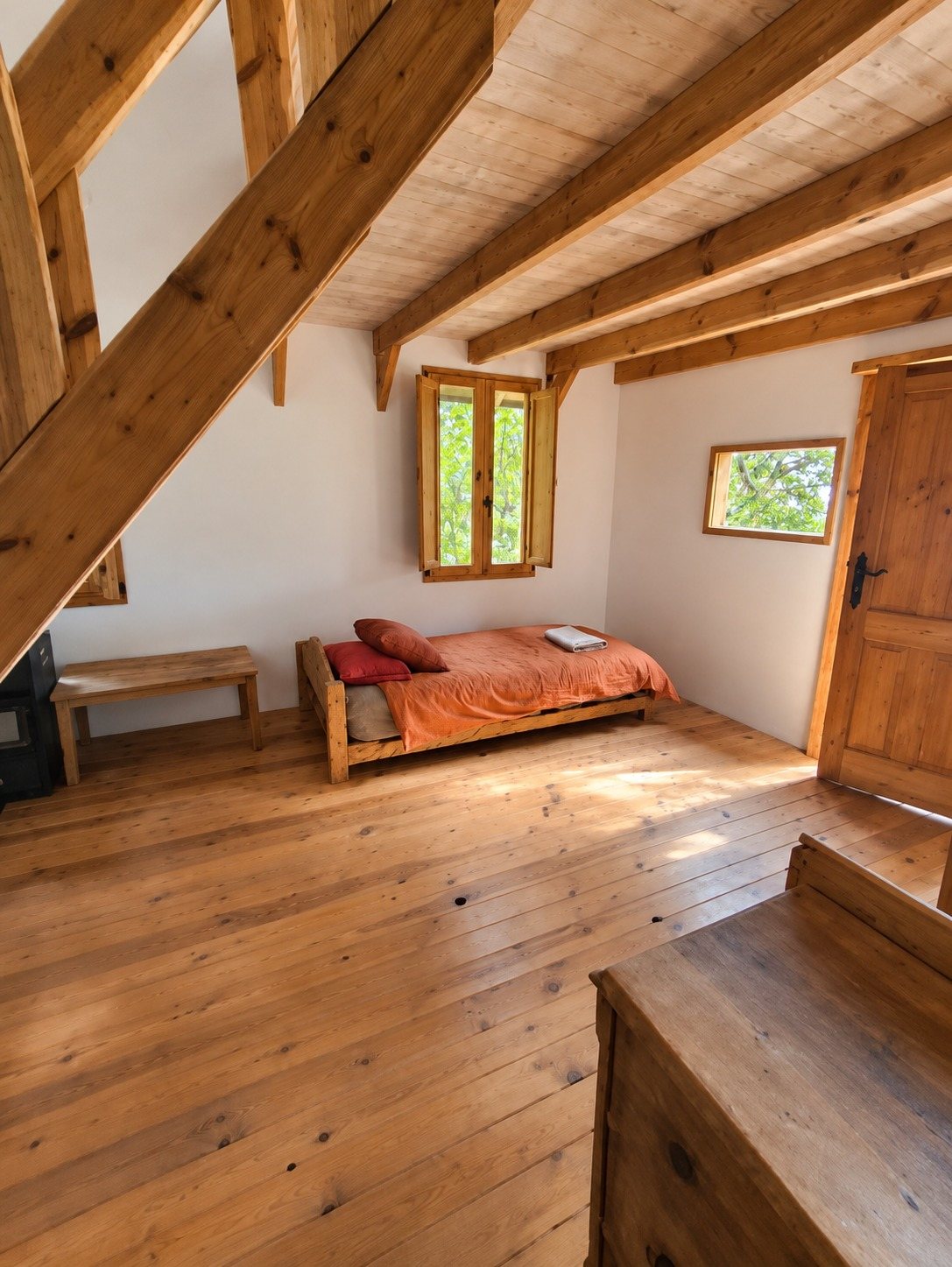 Casita — Downstairs, a bed in the sun